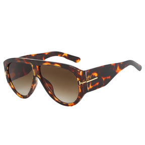 Óculos de sol feminino oversized Rosa Coral Brienza, armação leopardo e lente marrom – estilo sofisticado e proteção para os olhos.